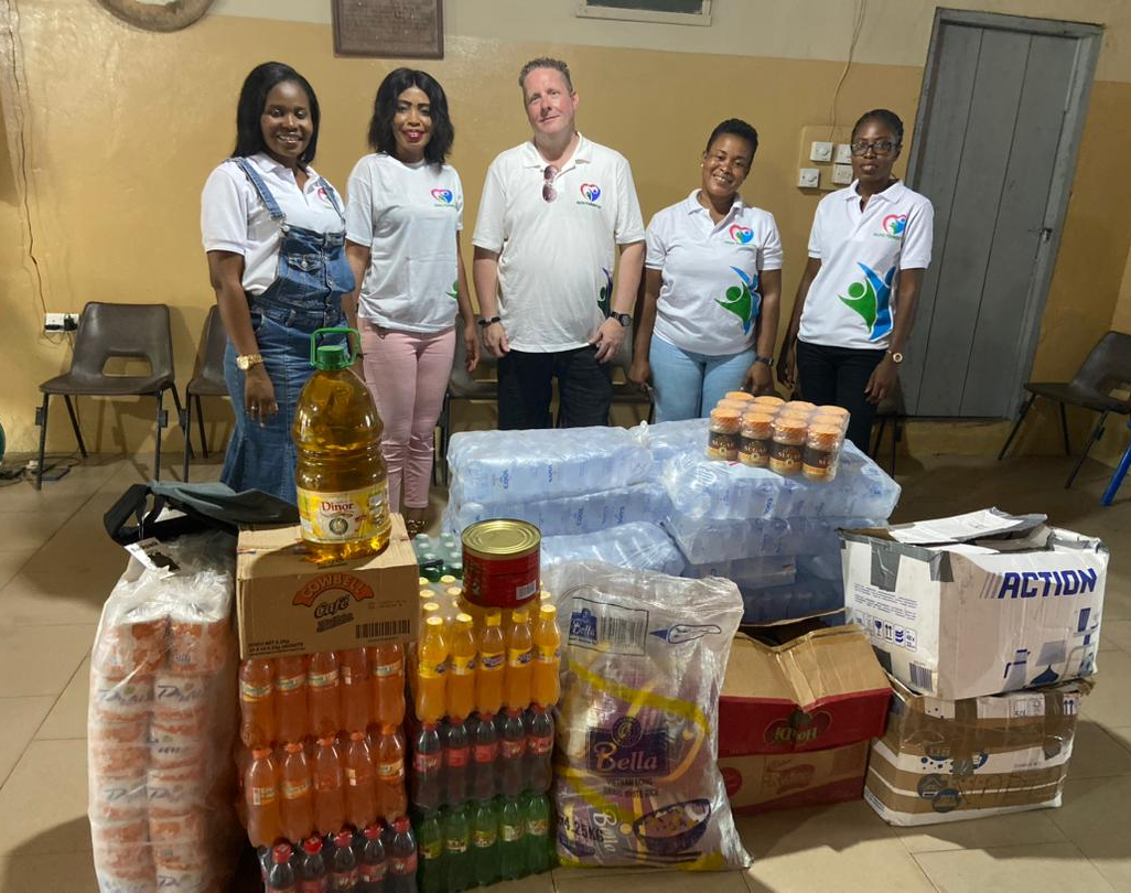 Nadig team with donated supplies at Mercy Home
